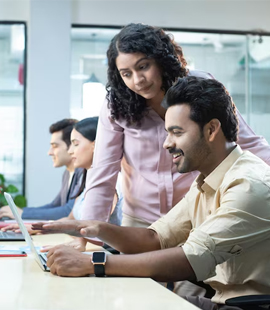 Customer support team collaborating in a Dubai office